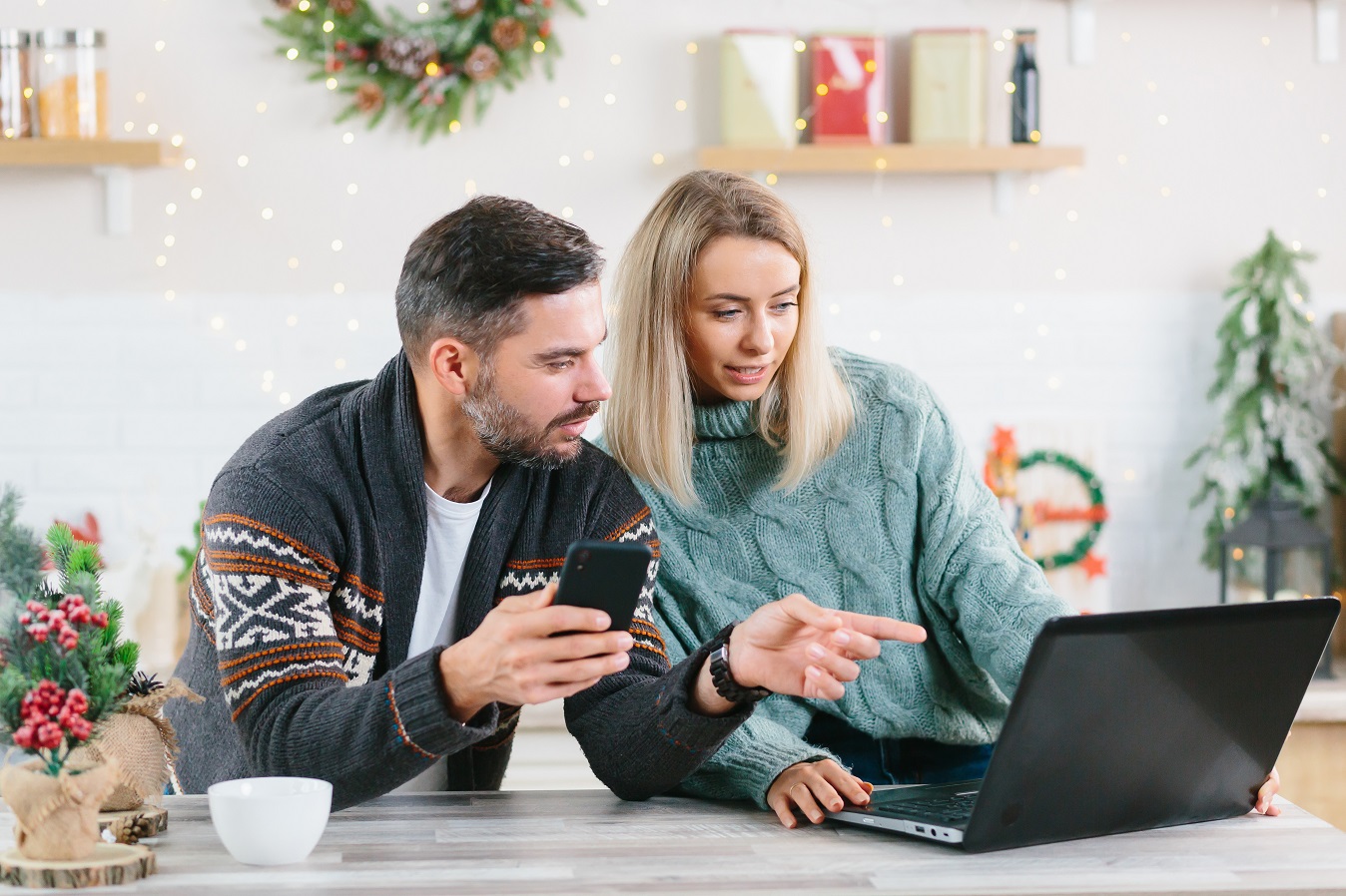 Husband and wife on laptop