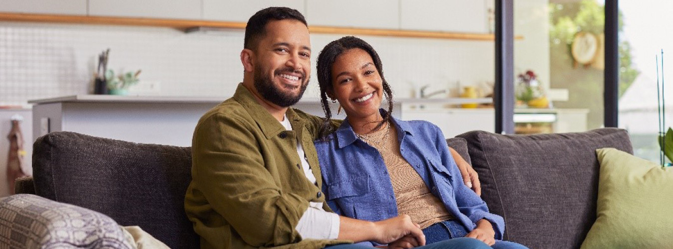 Couple Sitting on Couch